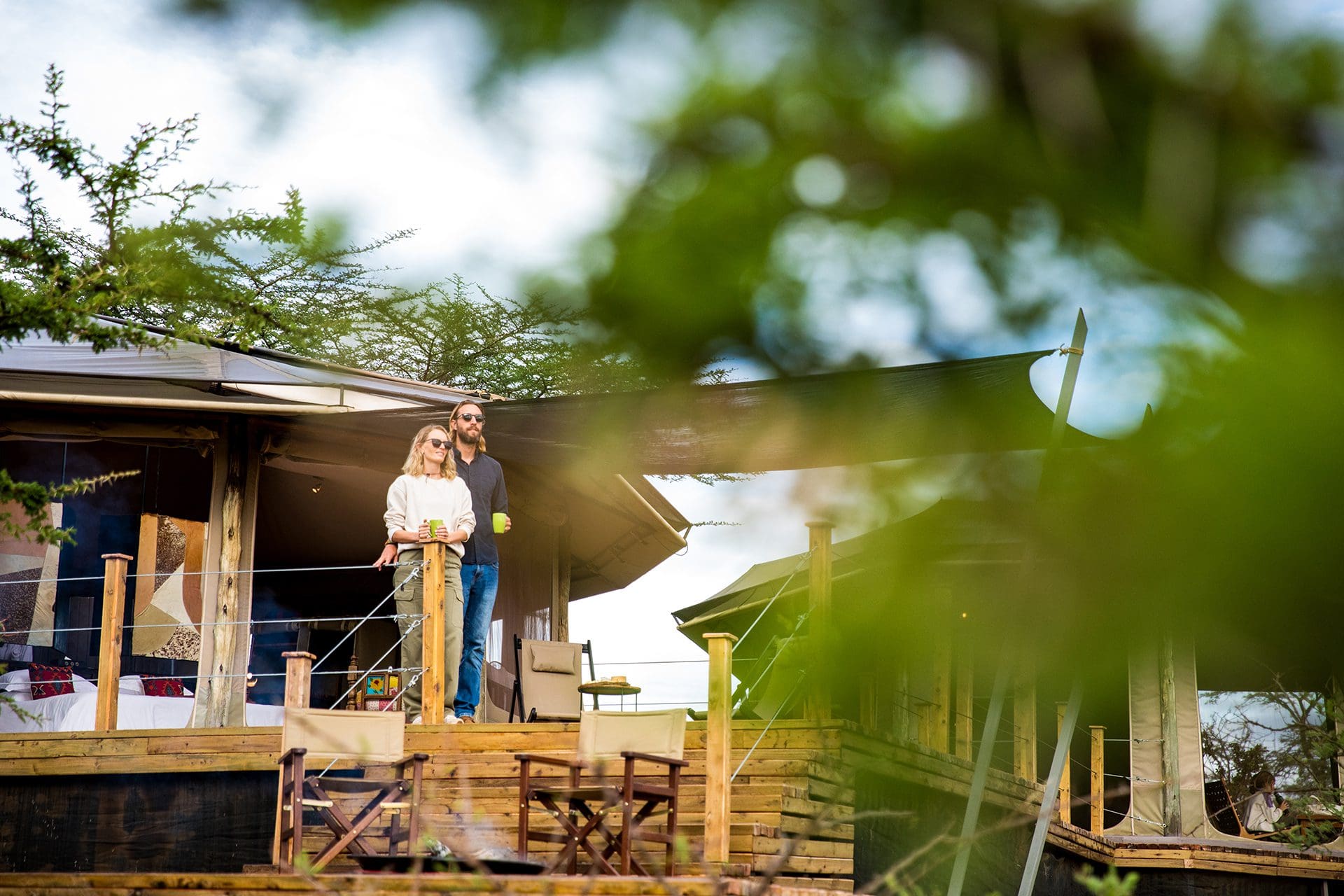 Saruni Leopard Hill 1 Saruni Basecamp Saruni Leopard Hill couple with coffee on deck
